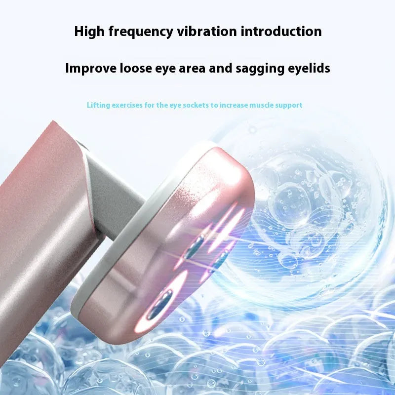 Gradient pink cat's paw shaped handheld micro-current eye and facial massager