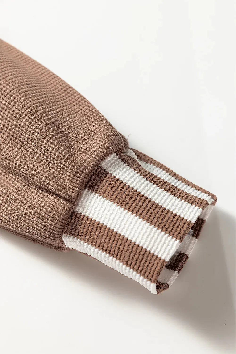 Straw yellow waffle texture striped hoodie with a button neck and drawstring hood.