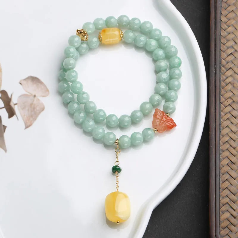 Double-layer women's bracelet with green jade round beads and beeswax barrel beads in retro design