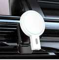 White magnetic wireless charging stand holding a mobile phone at an angle.