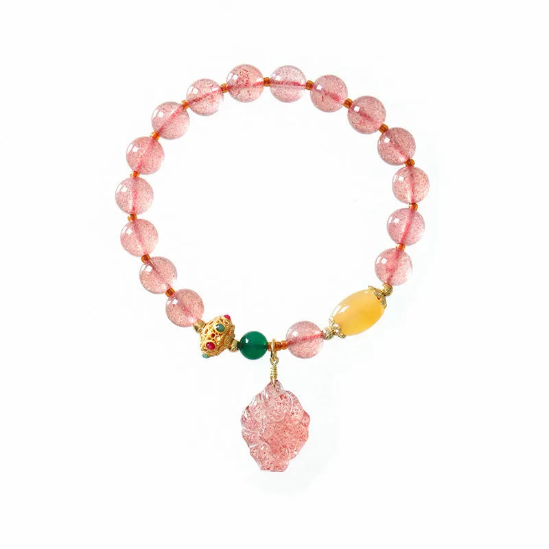 Women's crystal bracelet with polished strawberry quartz beads in nine tail fox colour design