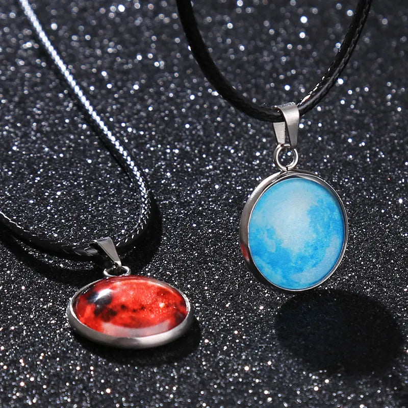 Luminous Christmas moon and starry night sky pendant necklace on a chain with extension.