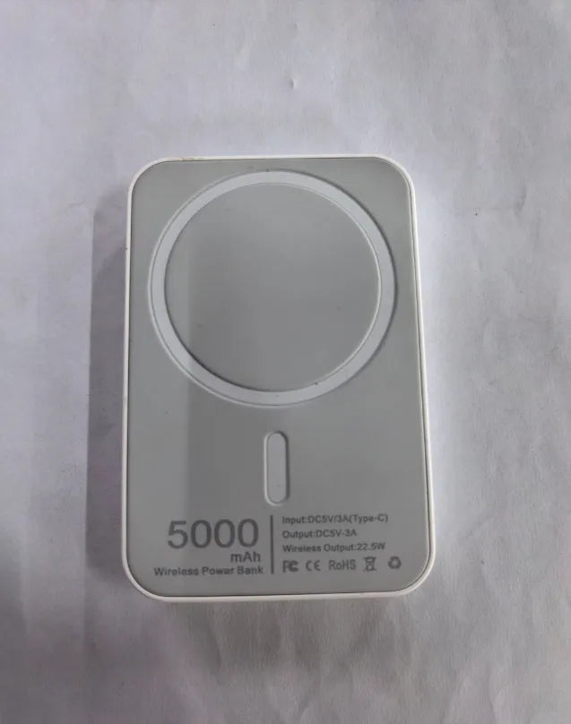 Compact magnetic wireless power bank with 5000mAh capacity in white PVC housing