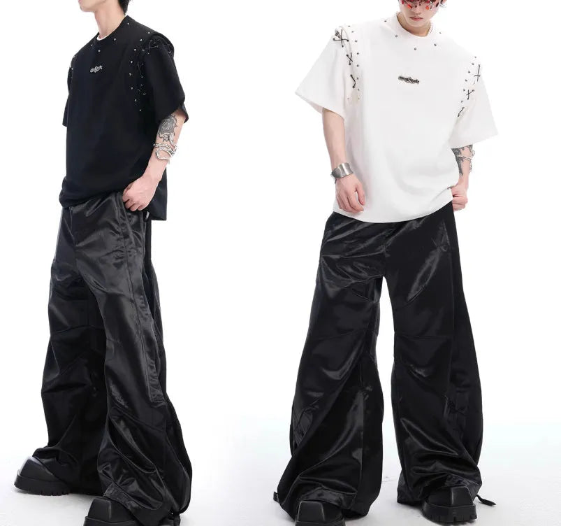 Black short sleeve T-shirt with a lace-up cutout design detail on the front.