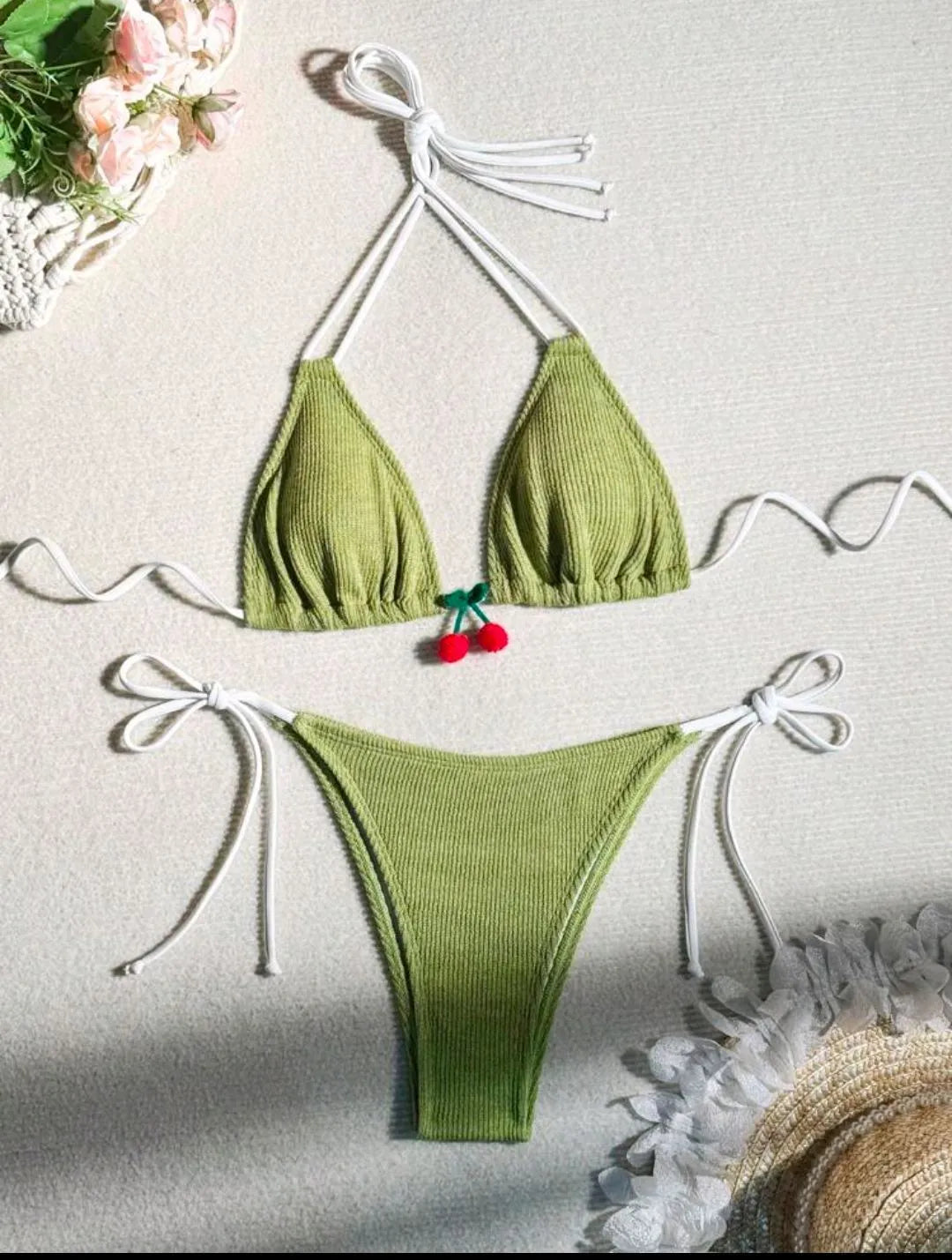Women's bikini swimsuit set in a briefs style, shown in one of five solid colours: apricot, matcha, orange, pink, or white.