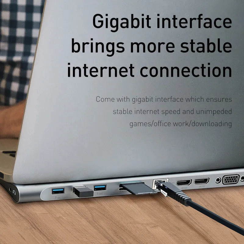 Grey aluminium ten-port docking station with cooling bracket showing HDMI, VGA and USB ports