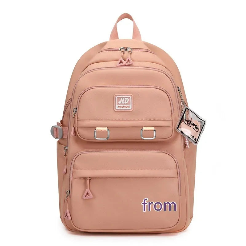 Large capacity nylon school backpack for girls in a choice of colours and geometric patterns.