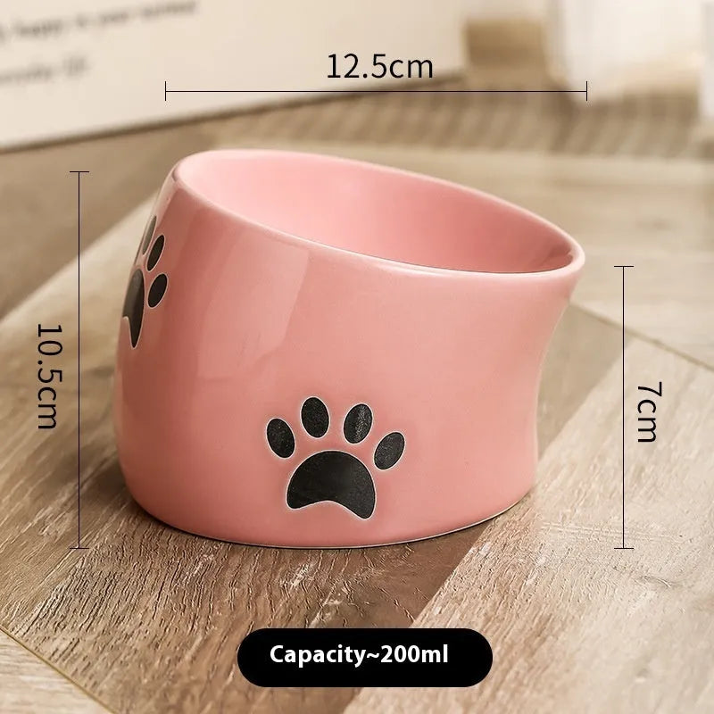 Ceramic cat bowl with high-footed design showing cat's paw decoration pattern in selected colour