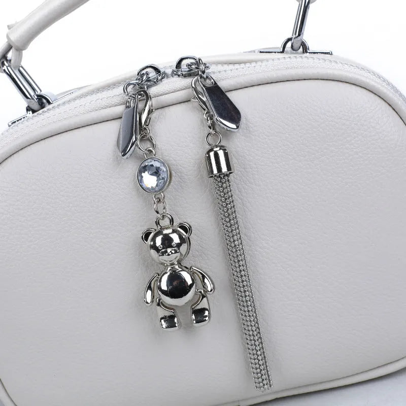 Women's stitching small square bag oval design showing mobile phone compartment and double shoulder straps