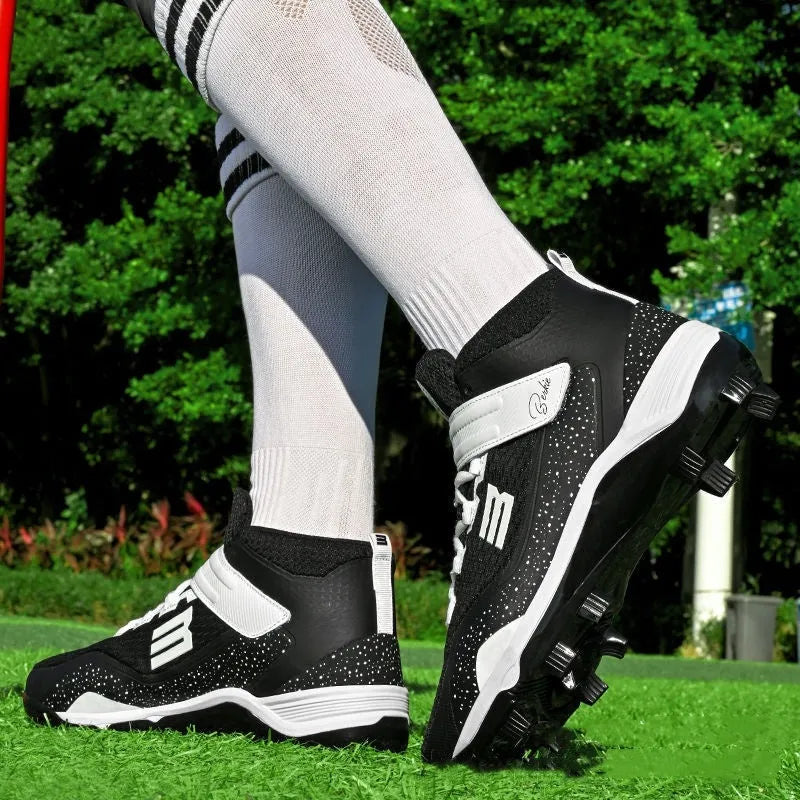 Adult black and white training sneakers with Velcro strap and wear-resistant rubber sole for softball.