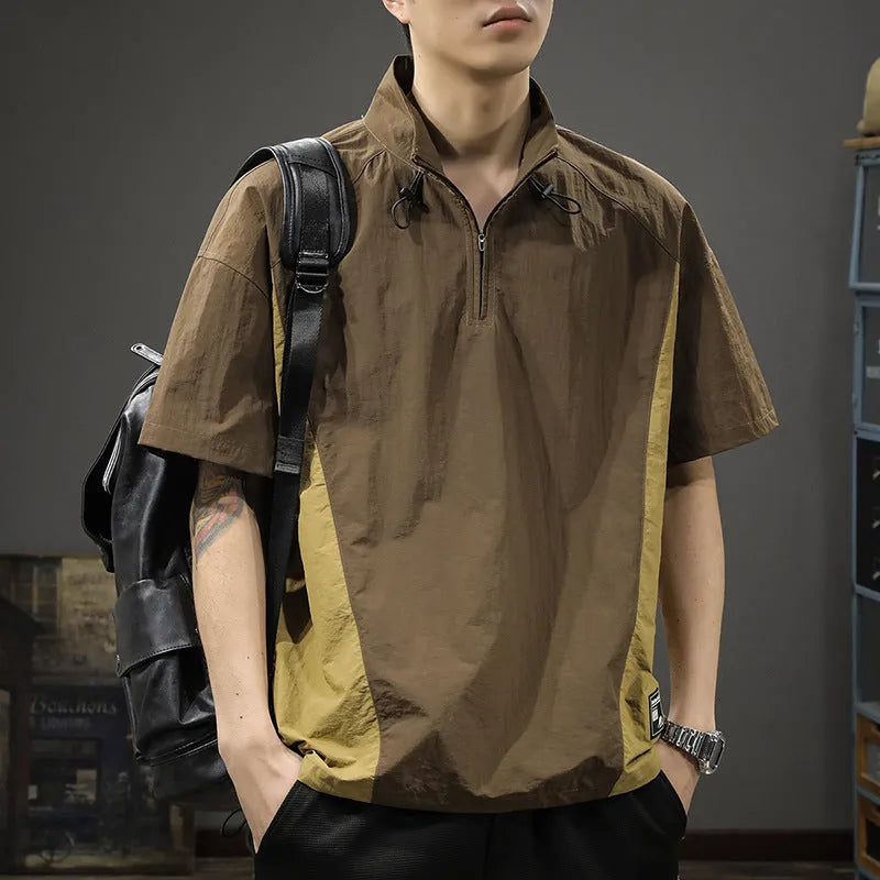 Brown men's short-sleeve half-zip shirt with a stand collar, showing the loose fit and ice silk fabric texture.