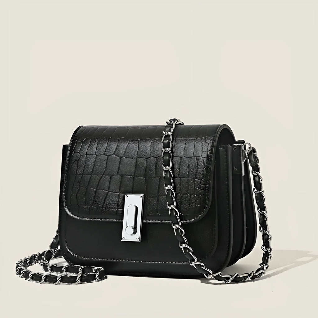 Soft PU women's fashion shoulder bag in horizontal square shape with phone compartment.