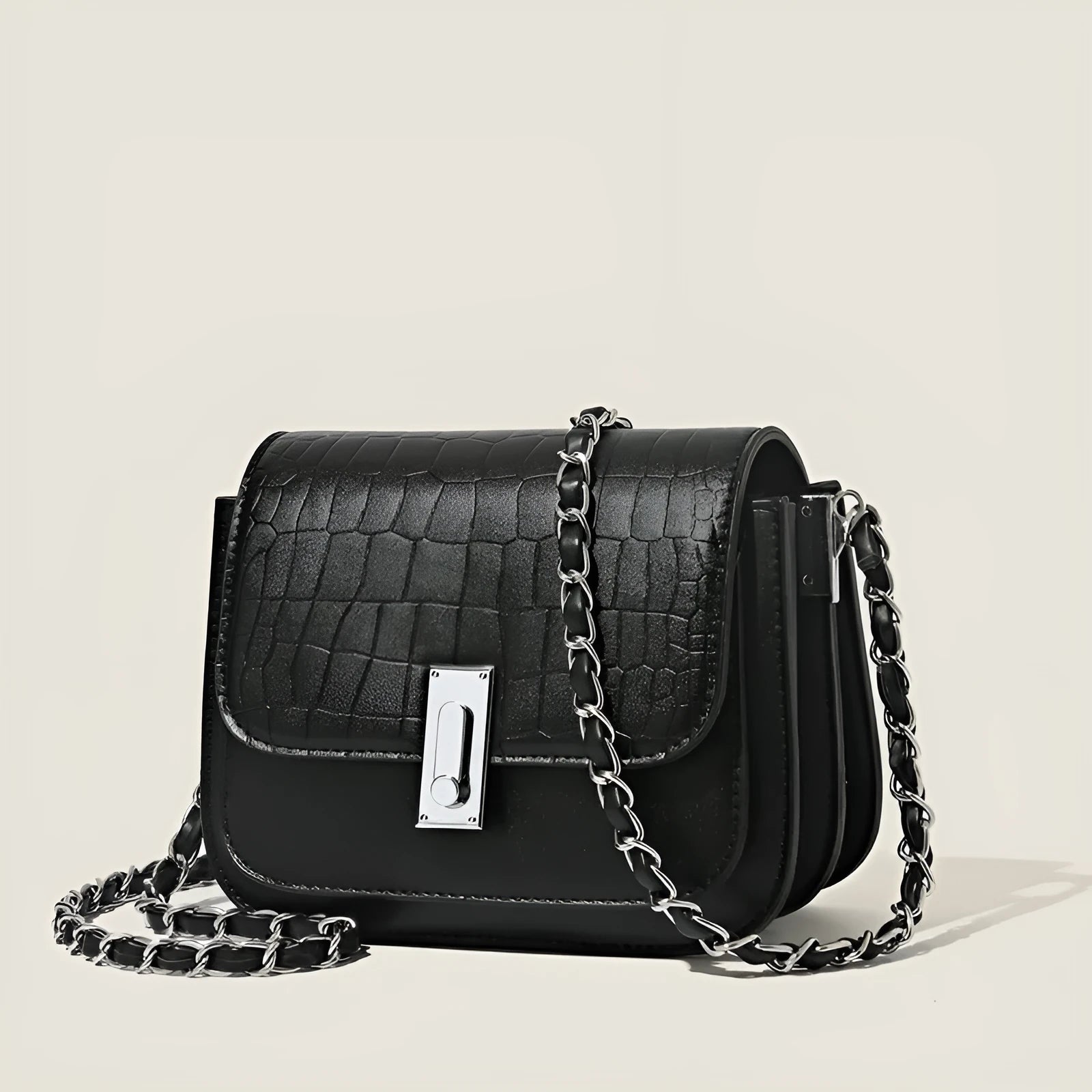 Soft PU women's fashion shoulder bag in horizontal square shape with phone compartment.