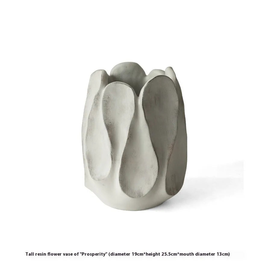 Irregular shaped ceramic vase for flower arrangements in art style with high and low versions
