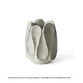 Irregular shaped ceramic vase for flower arrangements in art style with high and low versions