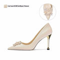 French crystal bridal high heel pumps with rhinestones on a cloth upper and pointed toe.