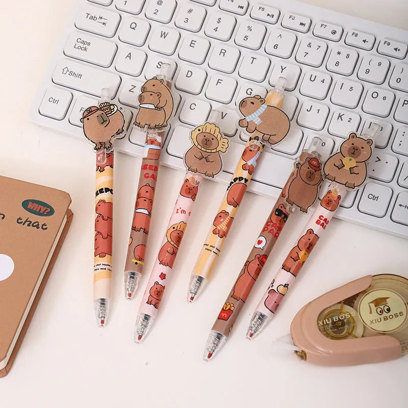 Open box showing 48 cartoon bear themed plastic gel pens with press barrels.