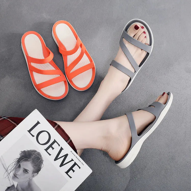 Women's solid colour PP beach sandals in red, purple, blue, black, grey, or pink showing slip-on casual style