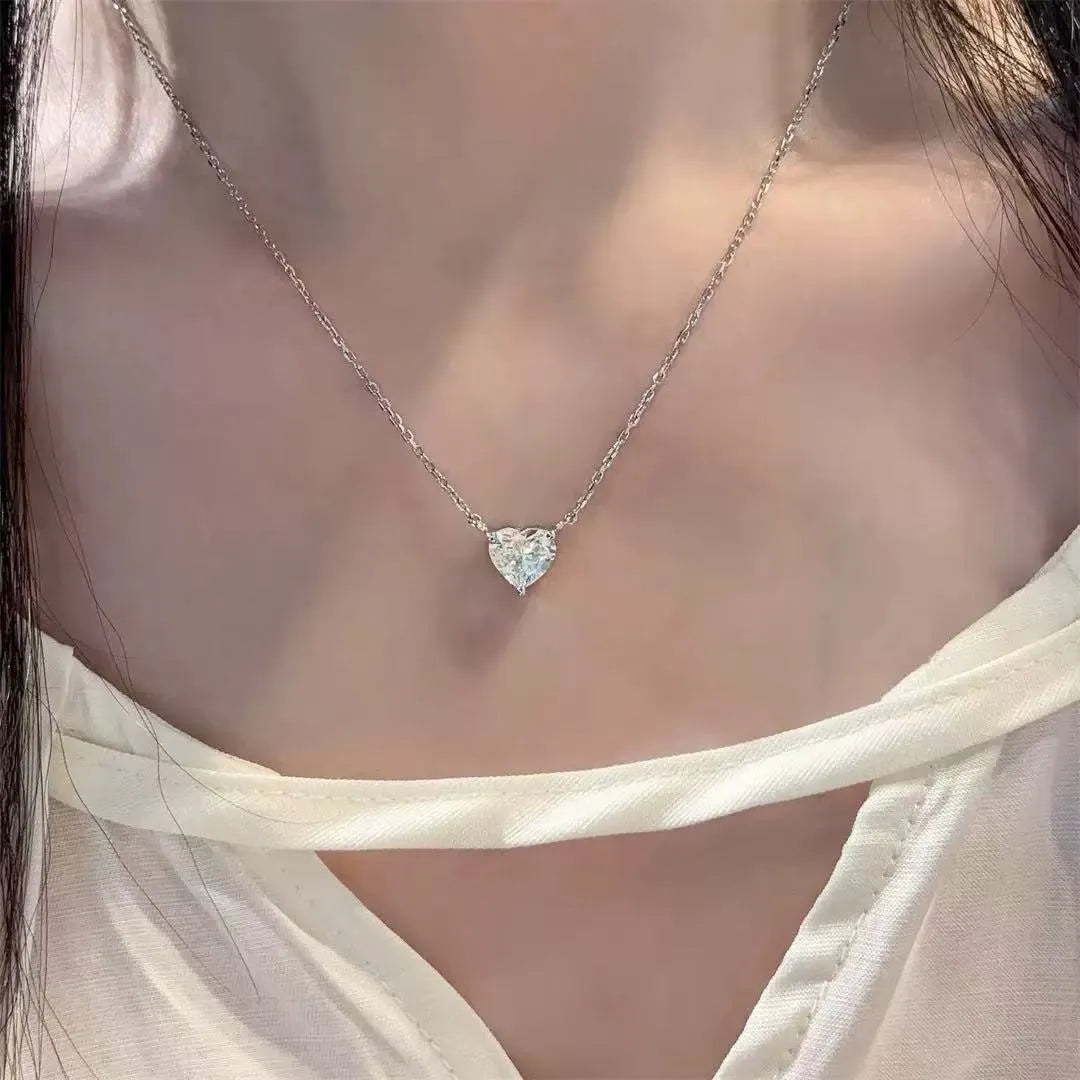Silver-colour heart necklace with copper construction and simple pendant design
