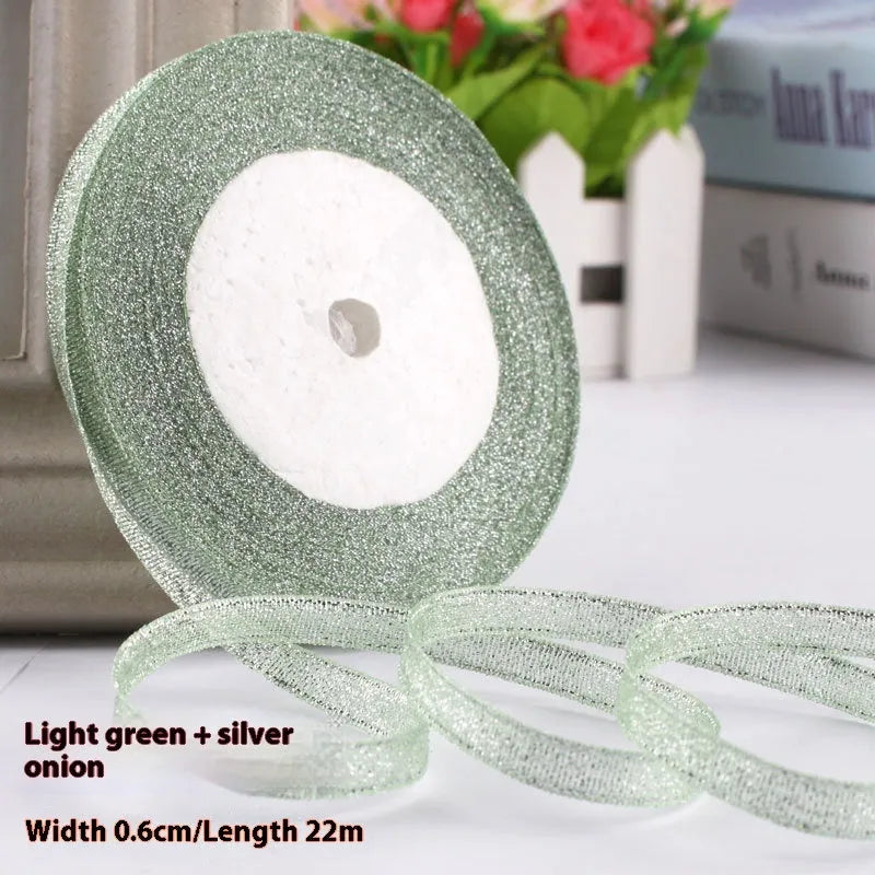 0.6cm wide polyester gift packaging ribbon roll in multiple colour options including gold leaf and jade pink