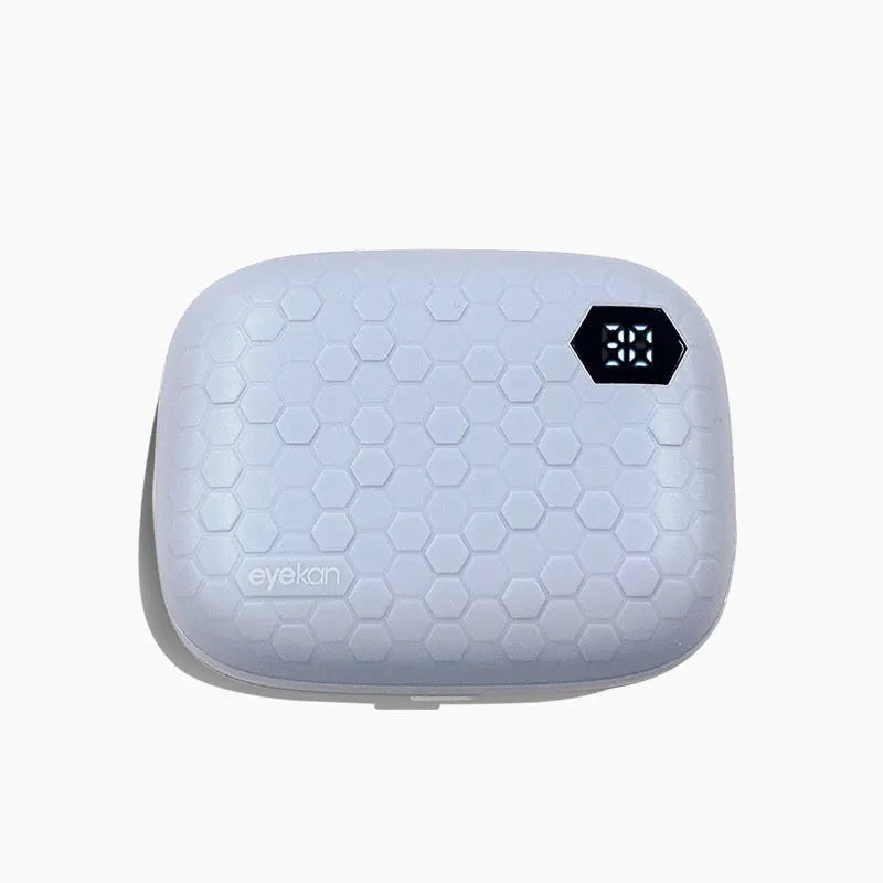 Pearl White automatic ultrasonic flushing instrument for cleaning invisible glasses on a table.