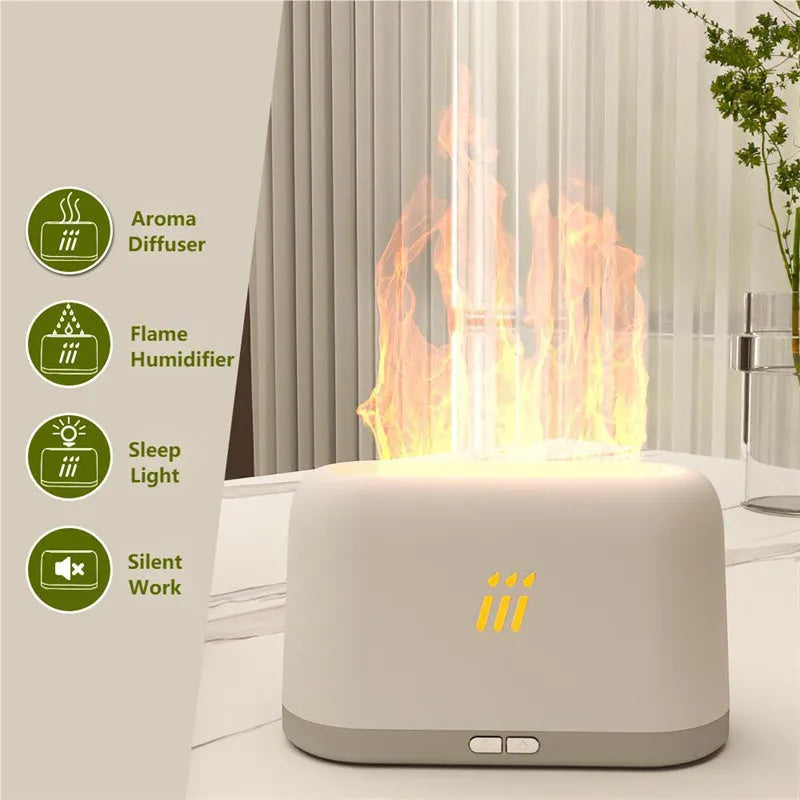 Black round ultrasonic humidifier and aroma diffuser with flame effect LED lights on a table.