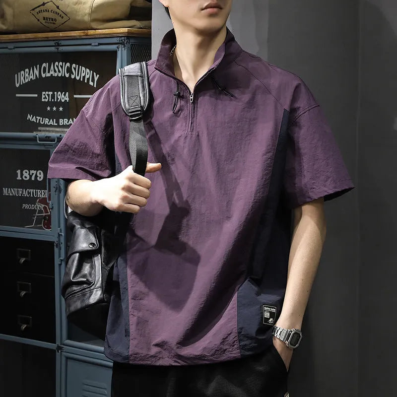 Brown men's short-sleeve half-zip shirt with a stand collar, showing the loose fit and ice silk fabric texture.