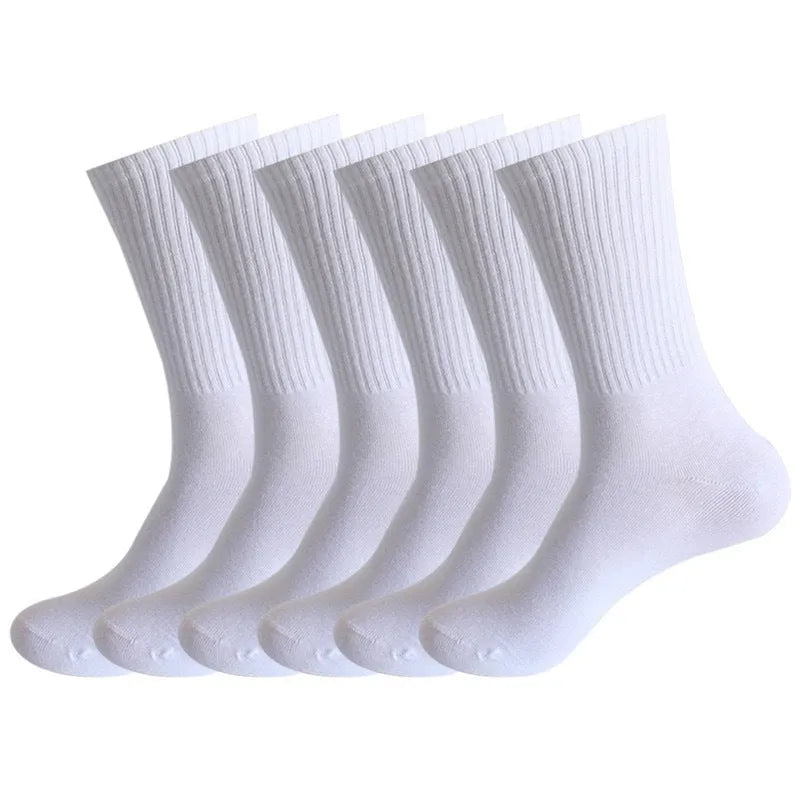Mid-calf length sports socks in black, white, and grey colours