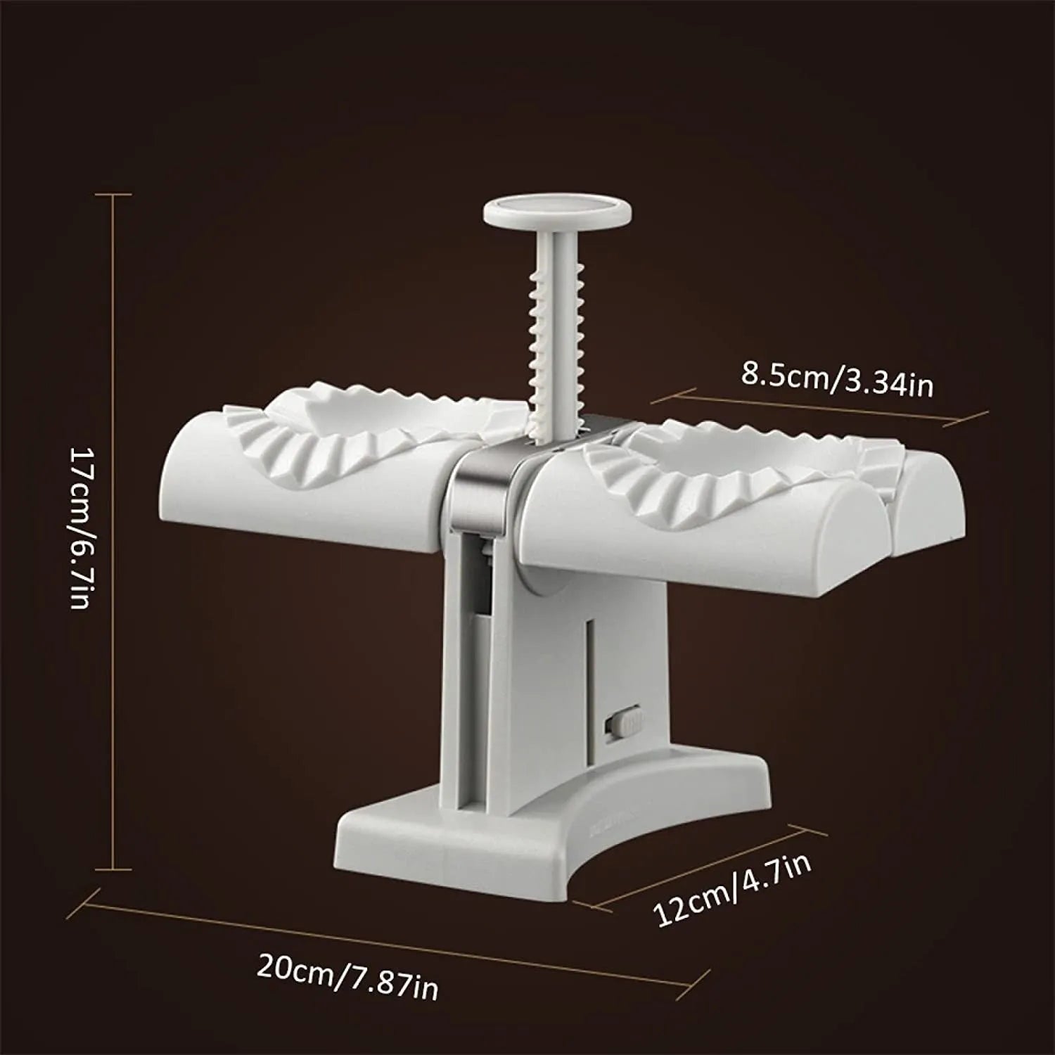 White plastic manual dumpling maker with double head press and anti-slip rubber base mat.