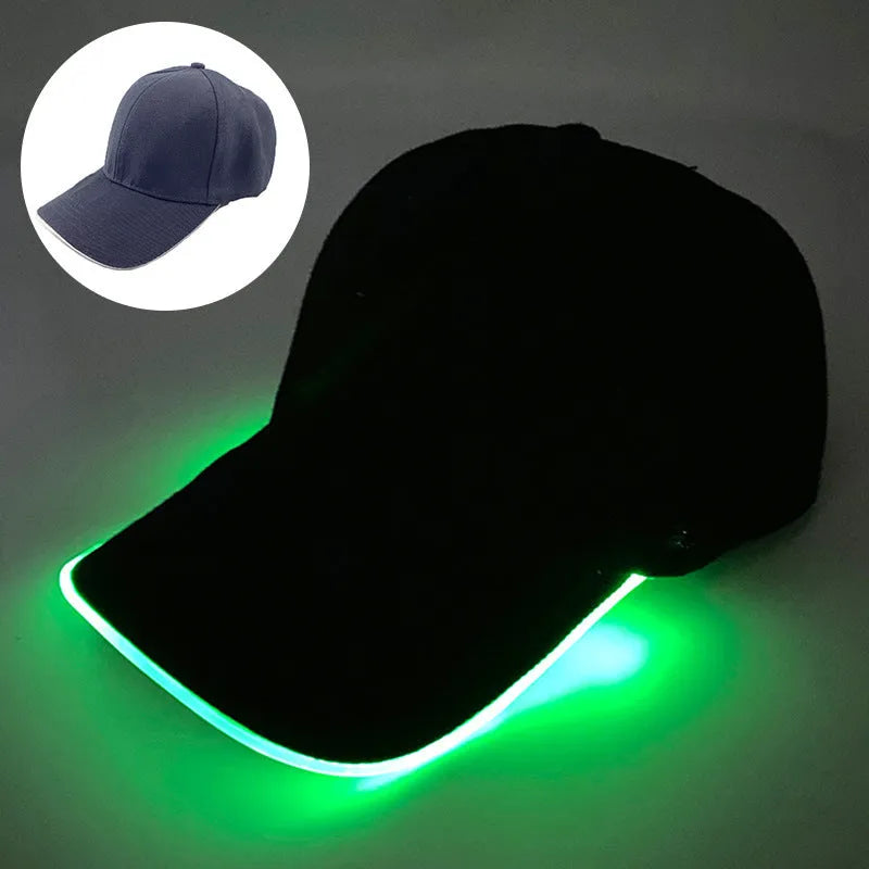 Black Halloween baseball cap with LED pumpkin smile face and yellow lights illuminated.