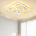 Modern white ceiling fan with integrated light and plastic blades, shown installed on a ceiling.