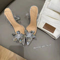 Women's transparent high heels with crystal flower detailing and pointed toe in three heel heights