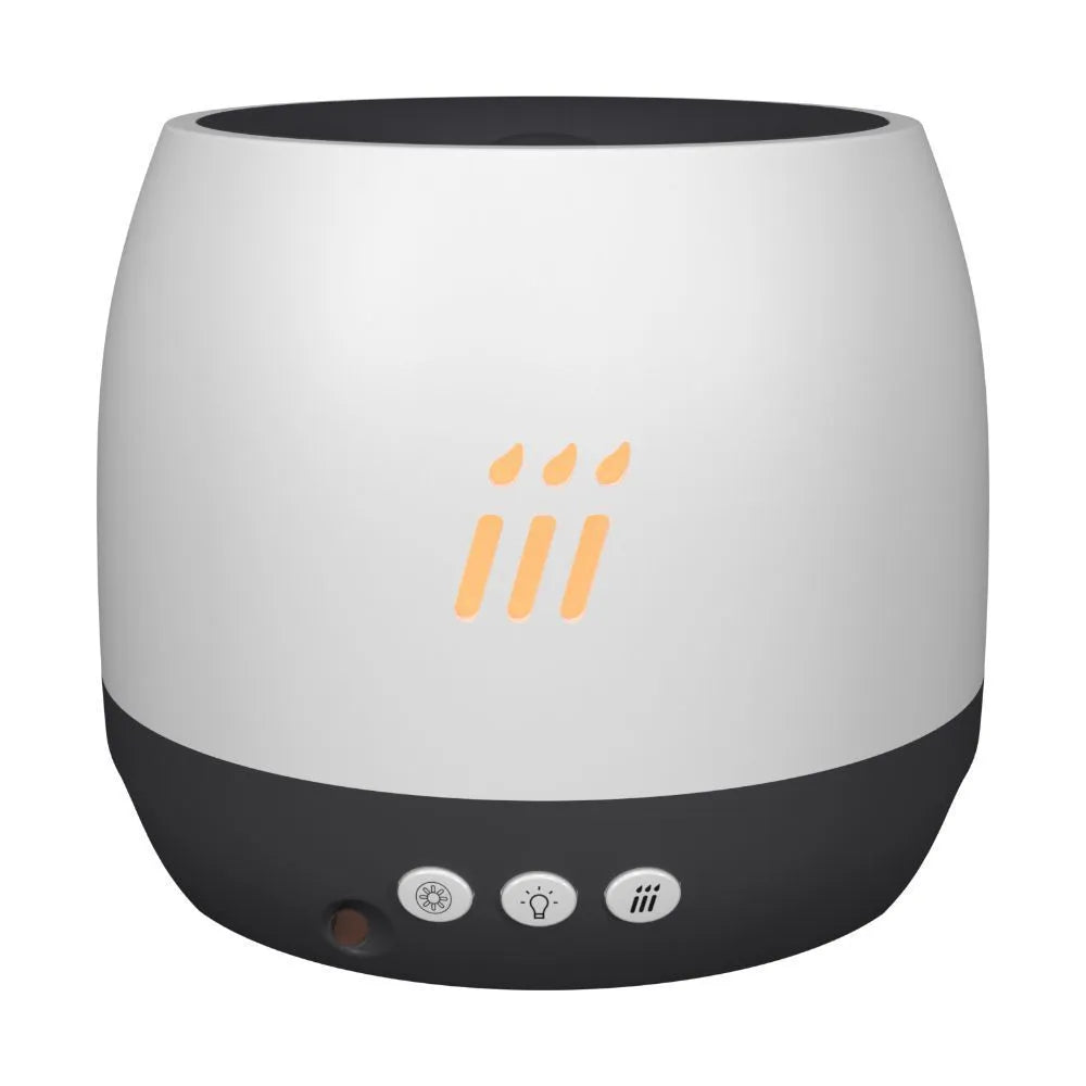 Black round flame aroma diffuser and humidifier with LED lights on a table.