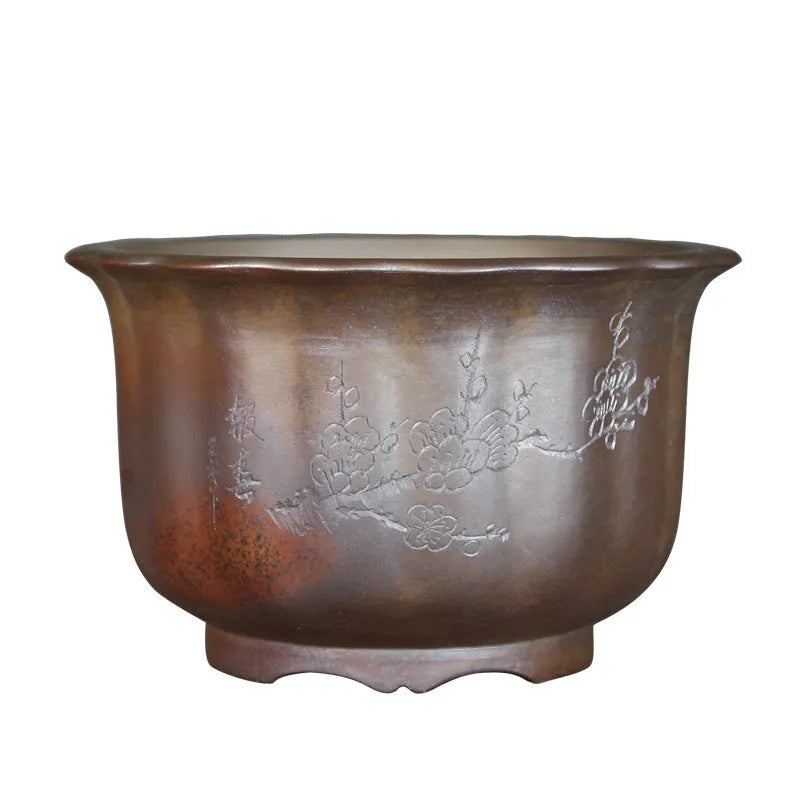 Antique carved purple sand ceramic bonsai pot in classical design for indoor plants.
