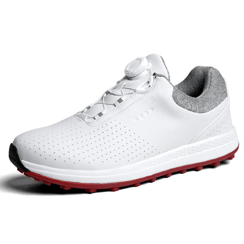 Men's low-top white casual golf sneakers with breathable upper and non-slip rubber sole on grass