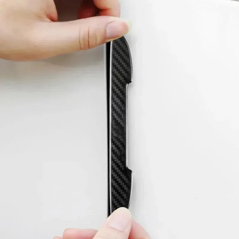 Black carbon fibre texture car door collision protection strips showing universal fit design