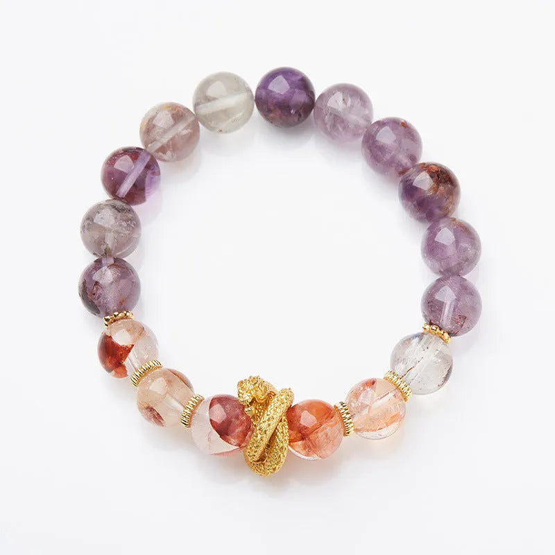 Purple cornucopia bracelet with nine purple crystals and zodiac animal design