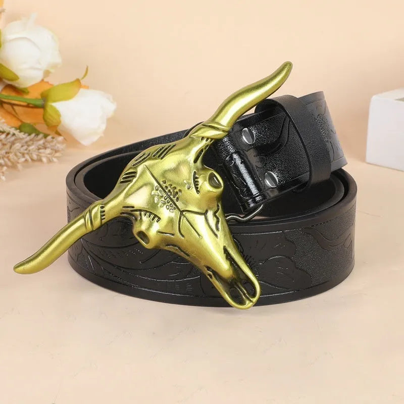 Men's brown imitation leather belt with detailed cow head alloy buckle showing carving and embossing details