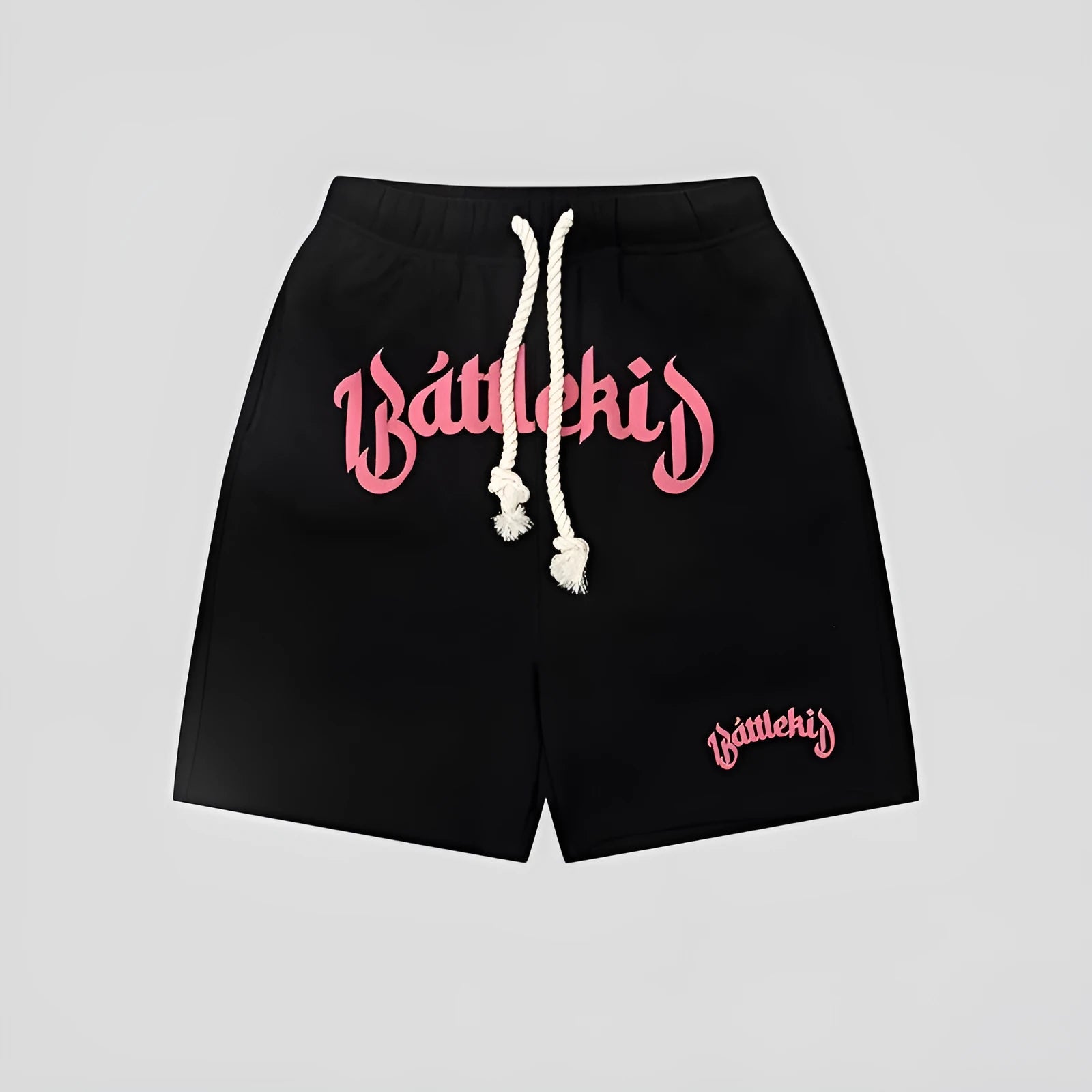 Men's black cotton loose-fit street style cropped shorts on a grey background.