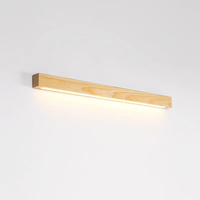 Modern walnut-coloured log strip wall lamp in three sizes on a white wall.