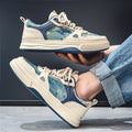 Men's beige and green canvas casual shoes with flat heel and round toe on white background