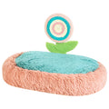 Pink elliptical cat nest bed with thick plush lining and a removable cover