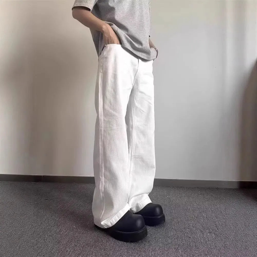 Men's white straight leg jeans with loose wide leg opening and American high street styling