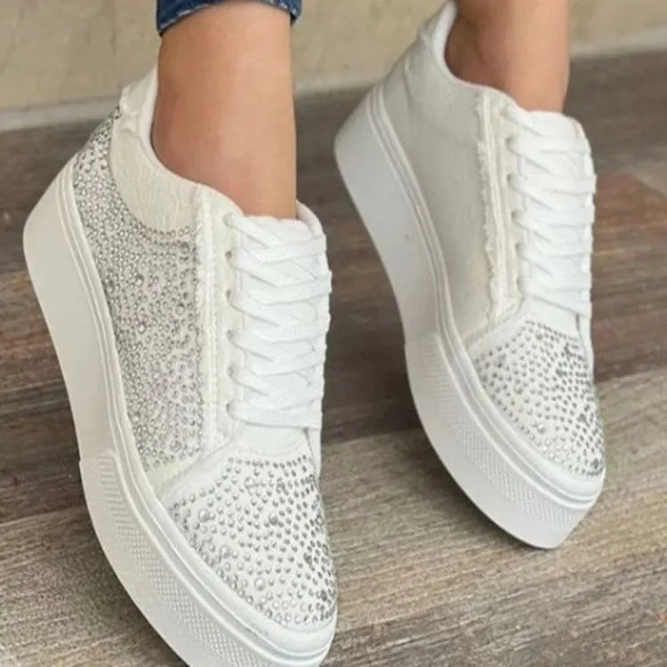Plus size women's black casual sports shoes with rhinestone detail, flat rubber sole, and lace-up front.