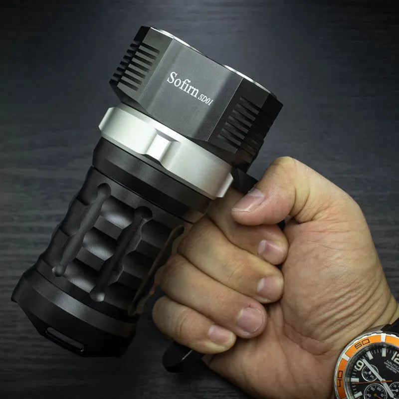 Aluminium alloy diving flashlight with 350 lumen output, shown with optional battery charger.