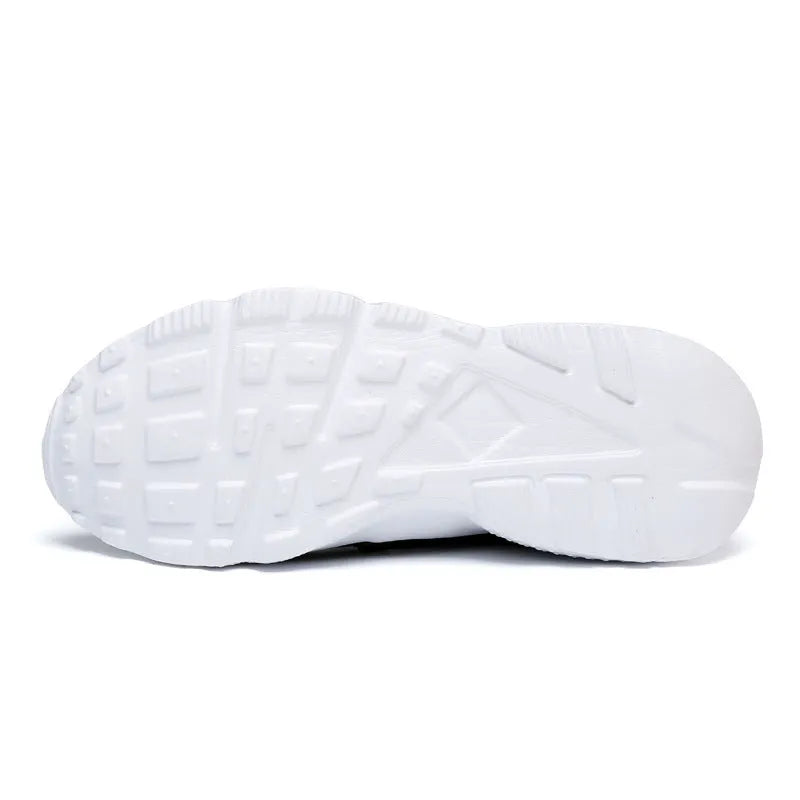 Women's lightweight mesh sports shoes with flat heel and round toe in black and white colour