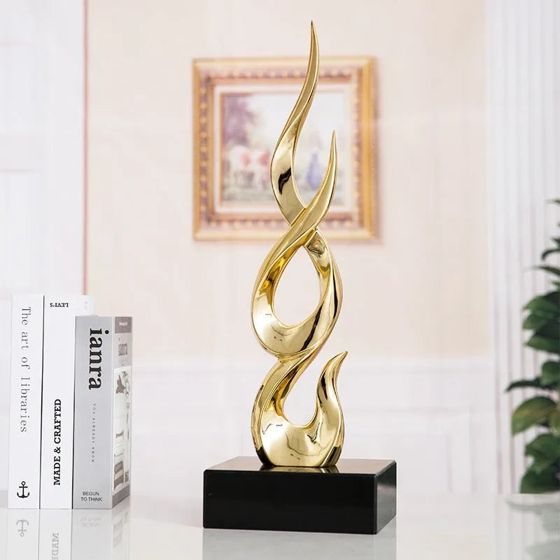 Modern resin festival decoration in gold finish with handmade craft elements