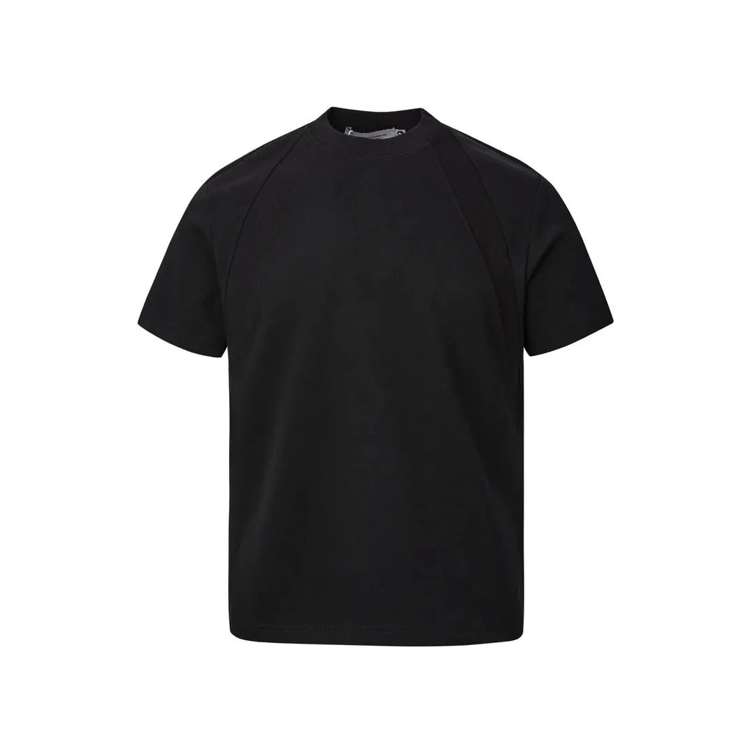 Loose fit short sleeve polyester top in black, shown on a model