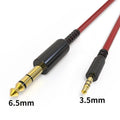 Red 3 metre gold plated 3.5mm to 6.5mm audio connection cable on white background