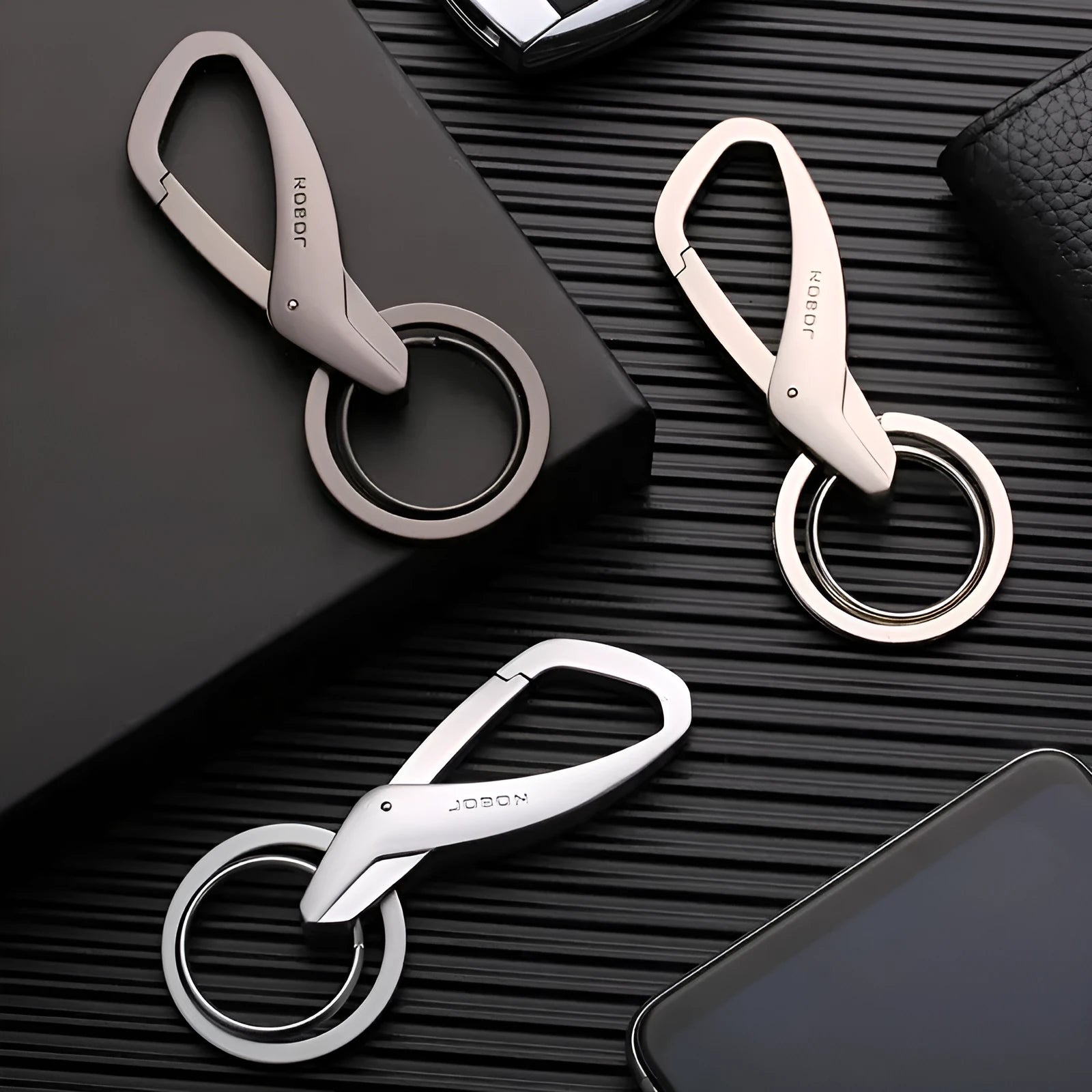 Zinc alloy double ring car key chain in black, chrome, or nickel colour with waist hanging design